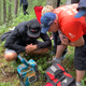 Estonian rally fans listen for updates on their favorite driver.